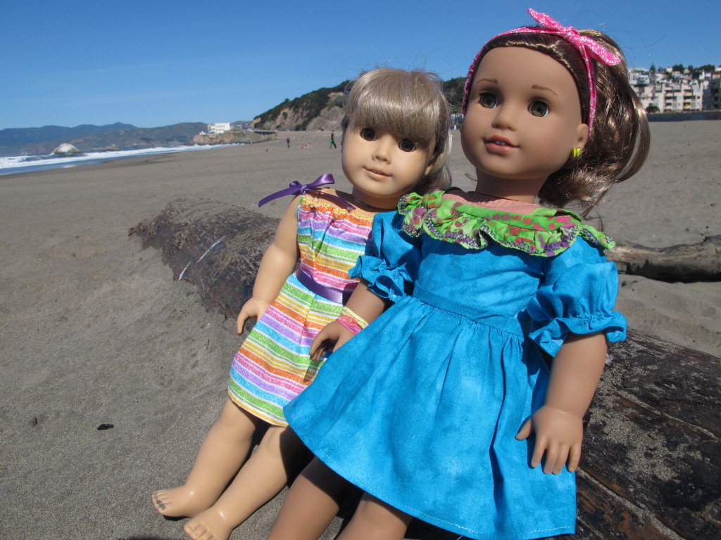 American Girl dolls in handmade dresses